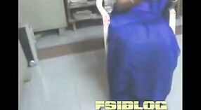 Indian sex video featuring a stunning Tamil office aunty in blue sharee 1 min 00 sec