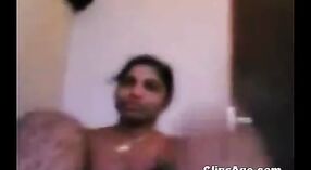 Indian sex video featuring a MILF nurse lady stripping and giving a blowjob 2 min 20 sec
