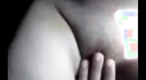 Indian sex video featuring a cute Bengali girl masturbating and fingering herself to orgasm 1 min 00 sec