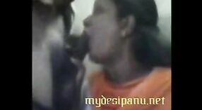 Indian sex video featuring aunty from the South office giving herSenior's dick a mouthful 5 min 20 sec