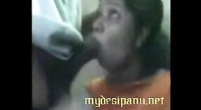 Indian sex video featuring aunty from the South office giving herSenior's dick a mouthful 6 min 20 sec