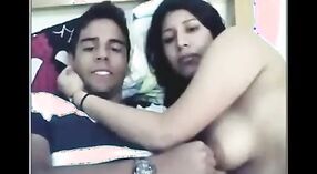 Desi aunty's first time with young boy MMS in Indian sex video 4 min 20 sec