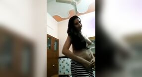 Solo Indian bhabhi strips down in a sari 1 min 10 sec