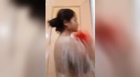 Nude Indian girl's solo performance in the bathroom 2 min 20 sec