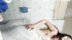 Monipuri, a Dhaka girl, takes a solo shower in a sari 0 min 0 sec