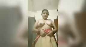 Desi Bhabhi's Nude Strip and Show of Her Gorgeous Breasts 0 min 50 sec