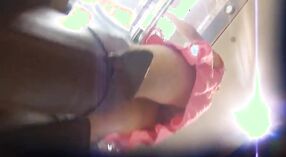 NRI girl gets naughty in a kiosk with hidden camera 1 min 00 sec