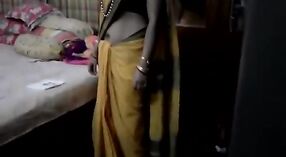 Tamil wife sex video featuring a hot tranny in a sari blouse 1 min 00 sec