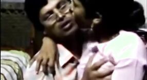 Beautiful tamil sex video featuring father kissing daughter and breast play 0 min 30 sec