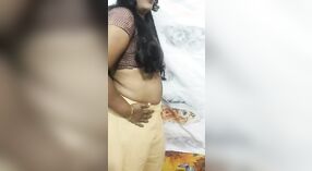 Dehati Bhabhi's sensual striptease in a sari is sure to leave you breathless 1 min 20 sec