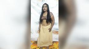 Dehati Bhabhi's sensual striptease in a sari is sure to leave you breathless 1 min 50 sec