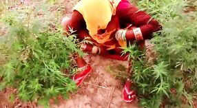 Desi village bhabhi gets down and dirty in the open air 1 min 10 sec