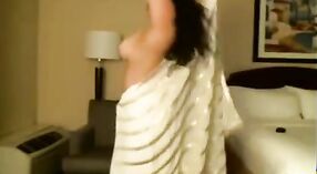 Desi milf in saree performs a sensual striptease in a homemade video that becomes a MMS 1 min 20 sec