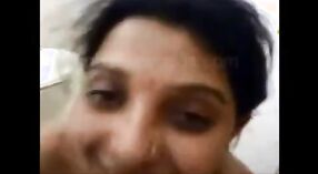 Indian aunt with big boobs pleases her young neighbor in this hot video 2 min 20 sec