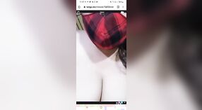 Busty Desi Bhabhi flaunts her curves in a live cam porn video 15 min 00 sec