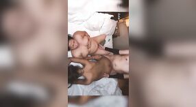 Desi couple enjoys a wild threesome with a pornographer on white sheets 7 min 00 sec