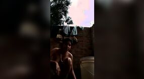 Desi babe takes a shower and shows off her sexy body in this outdoor video 1 min 30 sec