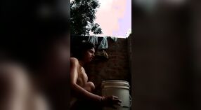 Desi babe takes a shower and shows off her sexy body in this outdoor video 2 min 10 sec