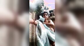 Desi babe takes a shower and shows off her sexy body in this outdoor video 3 min 10 sec