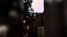 Desi babe takes a shower and shows off her sexy body in this outdoor video 0 min 30 sec