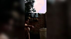 Desi babe takes a shower and shows off her sexy body in this outdoor video 0 min 40 sec