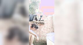 Desi babe takes a shower and shows off her sexy body in this outdoor video 0 min 50 sec