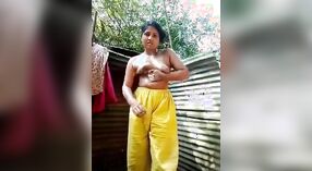 Desi girl takes a shower in an outdoor setting in this male MMS porn video 1 min 00 sec