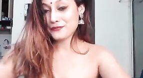 Watch a gorgeous Indian MILF strip down and tease you in this steamy video 6 min 10 sec