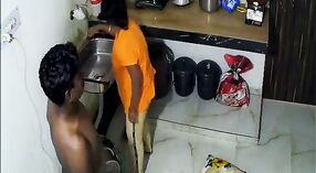 Indian aunt in yellow sari gets naughty with her lover in the kitchen 3 min 20 sec