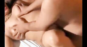 A Bengali sex tape featuring a busty bhabhi indulging in doggystyle with a guy 1 min 30 sec