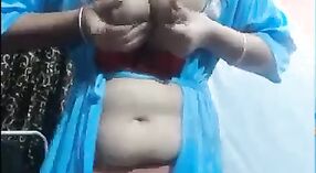 Busty Indian aunt shows off her sex skills with vibrator and mating dildo on camera 4 min 00 sec