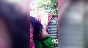 Desi bhabhi with big breasts swims topless in outdoor bath video 1 min 20 sec