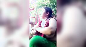 Desi bhabhi with big breasts swims topless in outdoor bath video 0 min 30 sec