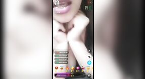 Desi model's big boobs get exposed in live cam show 1 min 00 sec