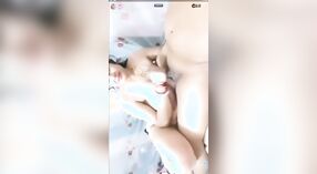 Desi babe with big boobs gets naughty on the phone in MMC film 1 min 00 sec