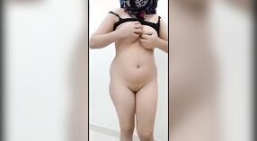 Desi girl from Pakistan shows off her anal and tits in a strip show 2 min 20 sec