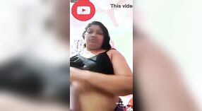 Big boobs and a costume change: a hot Tamil sex video 1 min 40 sec