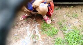 Indian MILF with big boobs enjoys outdoor pissing in this amateur video 1 min 20 sec