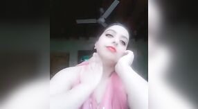 Aunty Indian's seductive striptease in a nude MMS video 1 min 10 sec