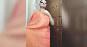 Beautiful Bengali girl in saree shows off her striptease skills 1 min 20 sec