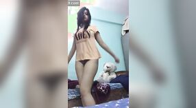 Hot babe shows off her dance moves and undresses in music video 0 min 0 sec