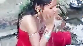 Indian Desi girl enjoys an open top in the shower 2 min 10 sec