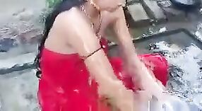 Indian Desi girl enjoys an open top in the shower 2 min 20 sec