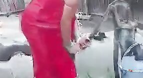 Indian Desi girl enjoys an open top in the shower 0 min 40 sec