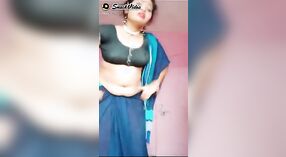 Hot bhabi in shorts shows off her big belly button 1 min 10 sec