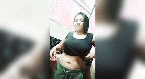 Jipsa Bigam flaunts her hot belly button and breasts in a black t-shirt on youtube 4 min 50 sec