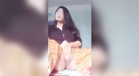 Cute and sexy teenage Asian girl with a hot pussy masturbates in desi video 1 min 30 sec