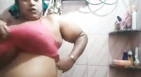 Busty aunty with big boobs shoots a steamy video in the bathroom 8 min 20 sec