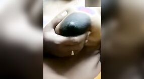 Indian aunty with big tits gets undressed and shows off in this steamy video 1 min 10 sec