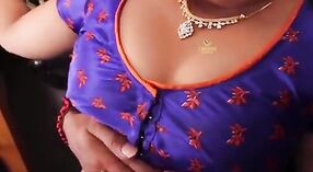 Indian bhabhi gets down and dirty in a scene from a popular music video 3 min 00 sec
